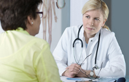 Doctor making a GP Referral